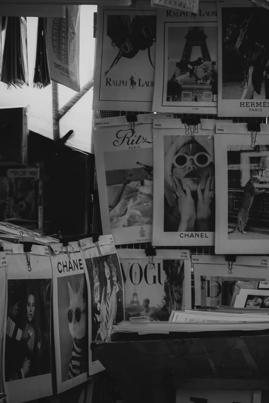 Black-and-white fashion magazine and editorial archive display