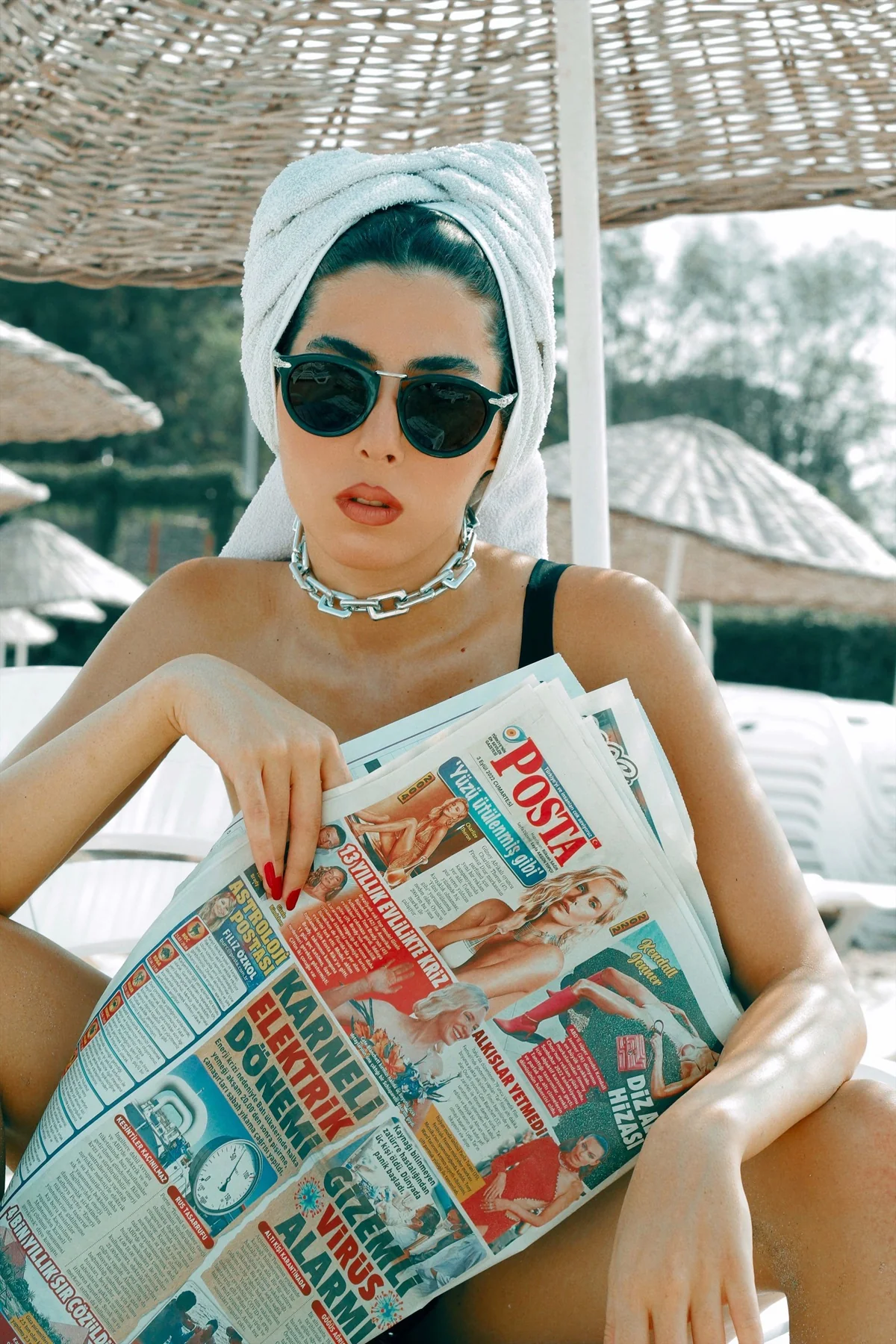 Luxury poolside fashion editorial with sunglasses
